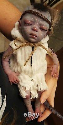 realistic alien baby doll