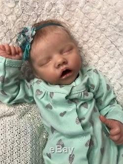 brown reborn baby dolls