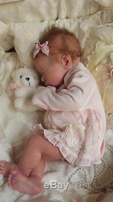 baby doll with umbilical cord