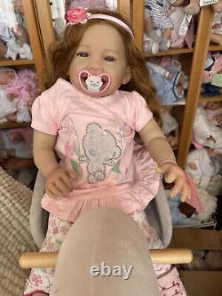 Adorable really sweet baby reborn toddler doll girl smiling Emma