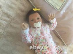 Beautiful Realborn mixed race reborn baby girl doll. Hand rooted hair. 19.5 ins