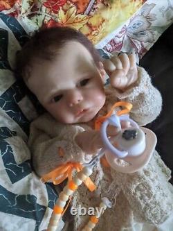 ELLIS an open eyed, cute, full limb, reborn baby girl