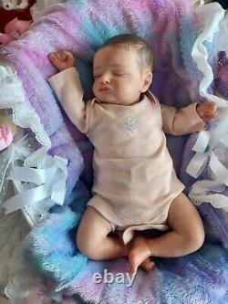 Genuine reborn baby dolls pre owned