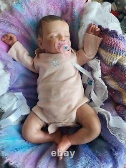 Genuine reborn baby dolls pre owned