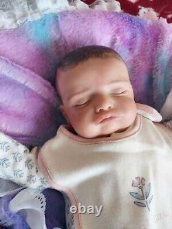 Genuine reborn baby dolls pre owned