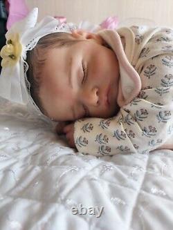 Genuine reborn baby dolls pre owned