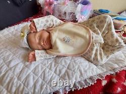 Genuine reborn baby dolls pre owned