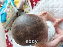 Genuine reborn baby dolls pre owned