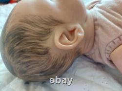 Genuine reborn baby dolls pre owned