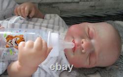 Handmade Lifelike Cuddly Reborn Doll Realistic Painted Hair Baby Girl Toy Gift