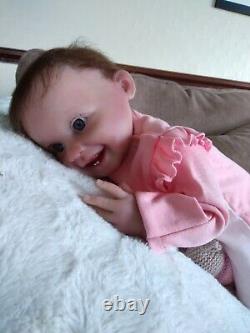 Happy cute little brown rooted head Reborn baby girl doll blue eyes