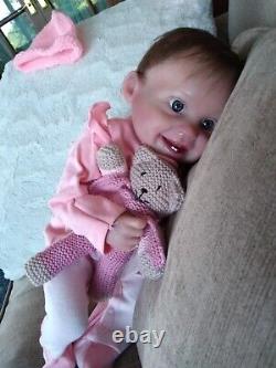 Happy cute little brown rooted head Reborn baby girl doll blue eyes