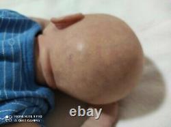 Joseph Reborn Realborn baby doll. A Realborn is a replica of the real baby