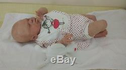 Lifelike realistic reborn baby girl doll by AJP Doll Studio