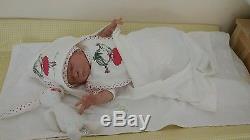 Lifelike realistic reborn baby girl doll by AJP Doll Studio