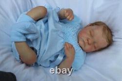 Lillbees stunning lifelike reborn baby Boy Levi B Brown With Coa