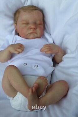 Lillbees stunning lifelike reborn baby Boy Levi B Brown With Coa