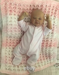 Lovely sleeping, reborn baby girl doll. Anatomically accurate fontanelle. 16 ins