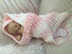 Lovely sleeping, reborn baby girl doll. Anatomically accurate fontanelle. 16 ins