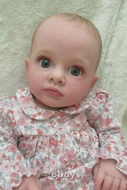 Realistic open eye reborn doll baby girl