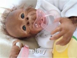 Reborn Realistic Baby Orangutan Monkey Baby Doll Binki with Breast Plate