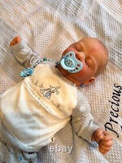 Reborn baby David doll created by artist Ruth Annette