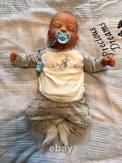 Reborn baby David doll created by artist Ruth Annette