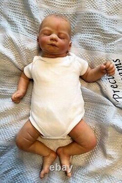 Reborn baby David doll created by artist Ruth Annette