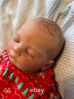 Reborn baby David doll created by artist Ruth Annette