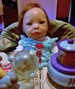 Reborn baby doll, breathes! Realistic rooted hair, silicone like vinyl
