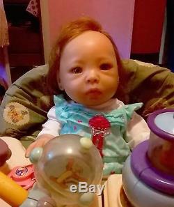 Reborn baby doll, breathes! Realistic rooted hair, silicone like vinyl