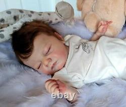 Reborn baby girl Beautiful hand painted and rooted realistic doll