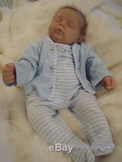 Solid silicone Adorable Reborn baby girl or boy realistic reborn doll